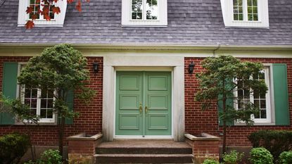 house exterior with green door