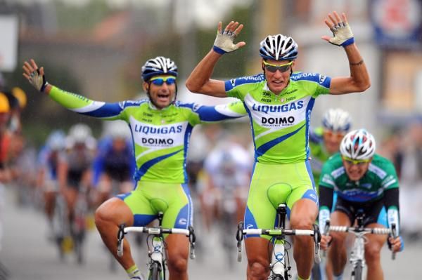 Jacopo Guarnieri (Liquigas - Doimo) wins stage two while teammate Francesco Chicchi celebrates.