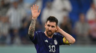 Lionel Messi waves to supporters after his team won the Qatar 2022 World Cup Group C football match between Poland and Argentina at Stadium 974 in Doha on 30 November, 2022.