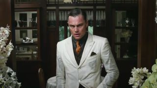Leonardo DiCaprio looking distressed as he enters the room in The Great Gatsby.