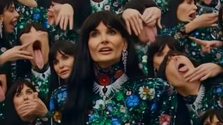 A scene showing actress Demi Moore in contorted poses generated by AI for the Gucci movie The Tiger