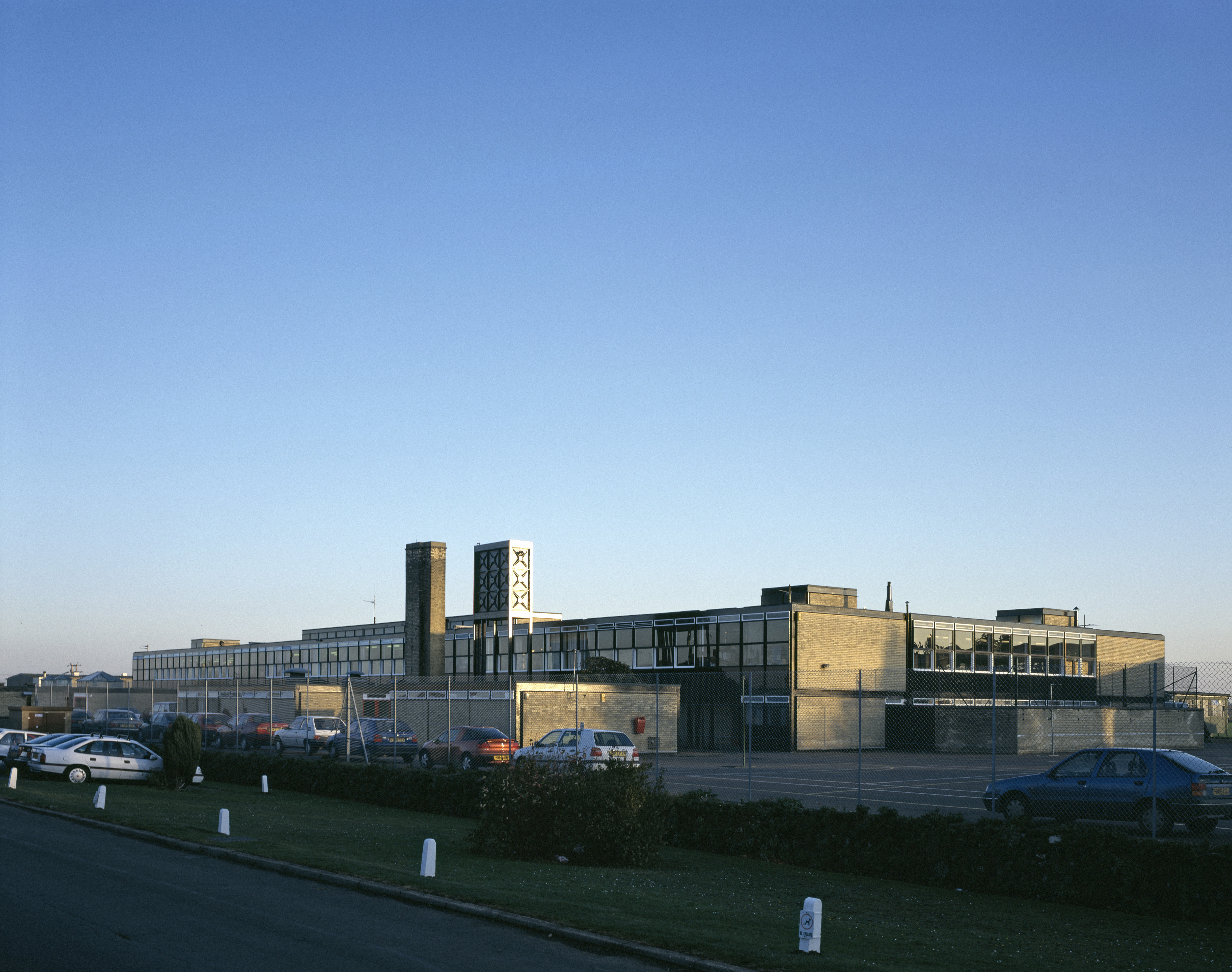 views of brutalist school on blue sky day - Hunstanton school aka Smithdon High School by alison and peter smithson