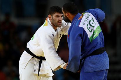 Egyptian judo fighter Islam El Shehaby refused to shake hands with his opponent, Israel's Or Sasson, following the match, underscoring tensions between the two countries.