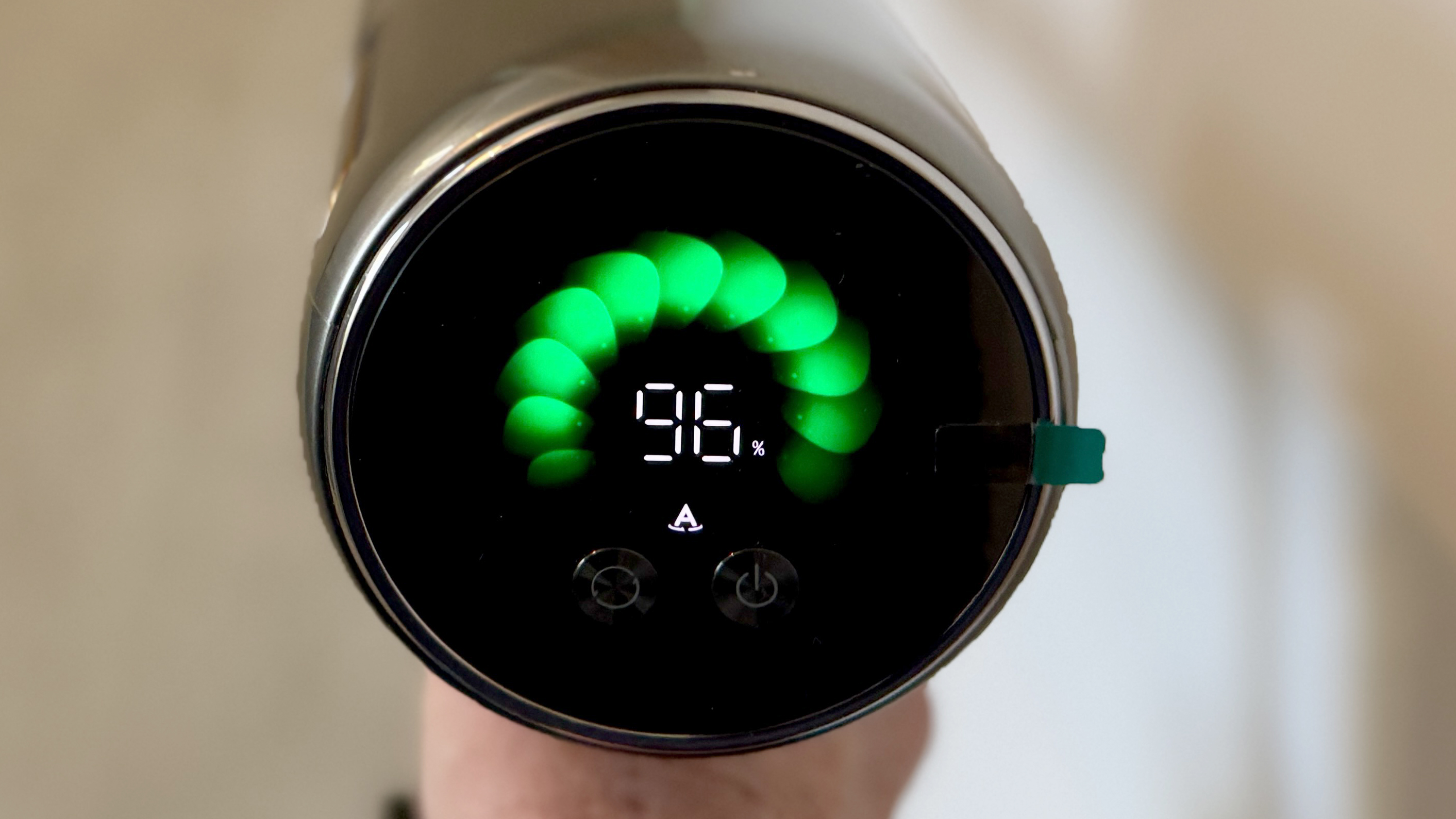 Dreame V20 Pro vacuum interface glowing green to show a clean floor