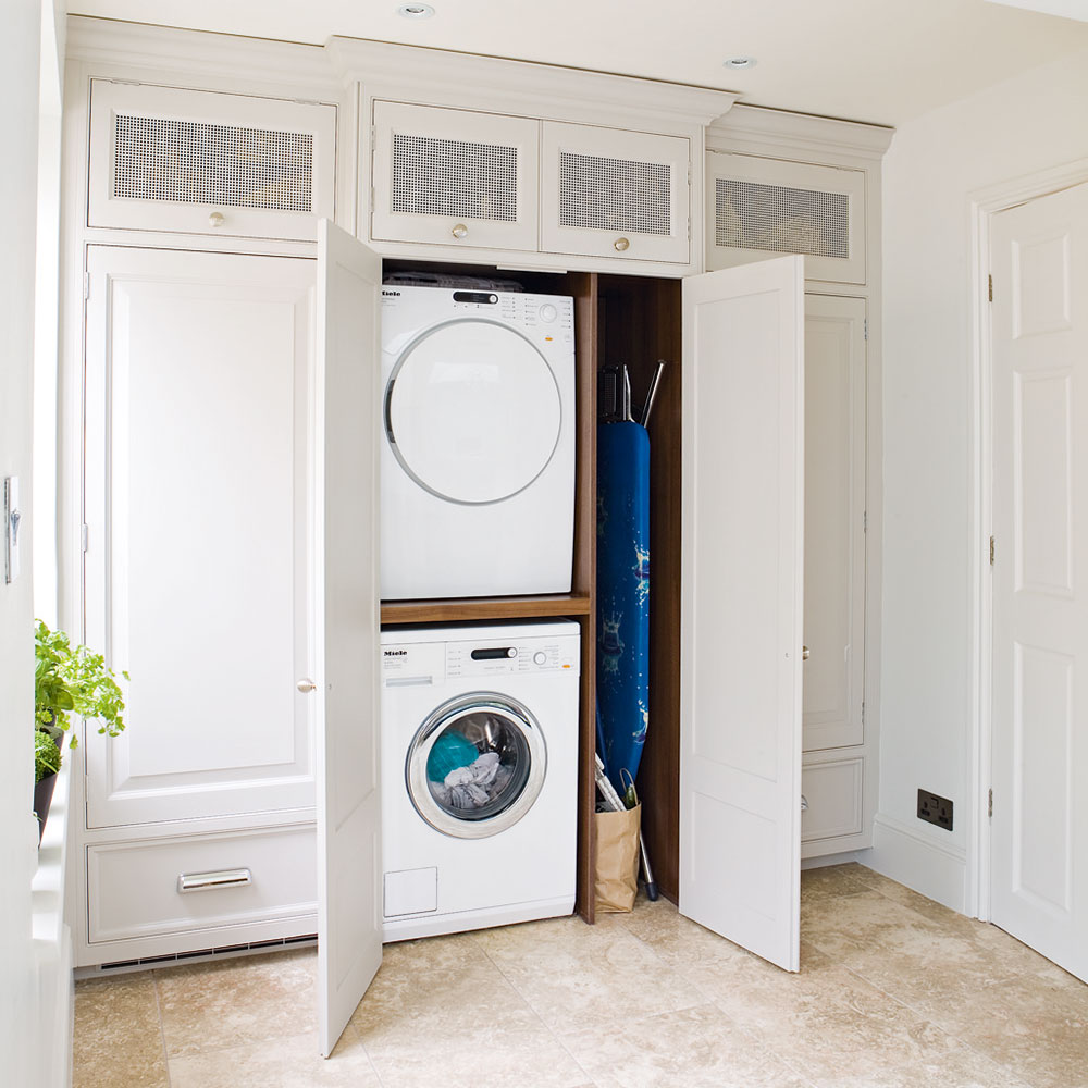 bedroom with white cabinet and white window with white door