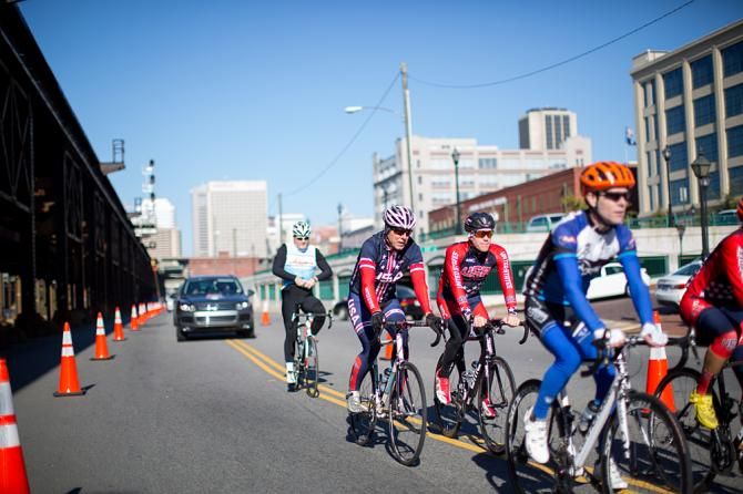 Brent Bookwalter rides at the back of the group