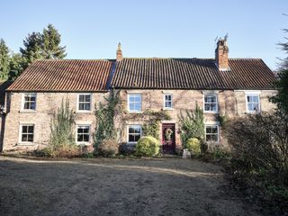 exterior of stone mill house cottage