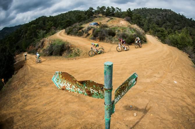 Racers pass by