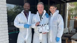John Simm, Richie Campbell and Laura Elphinstone pose for the camera during the filming of Grace season 6