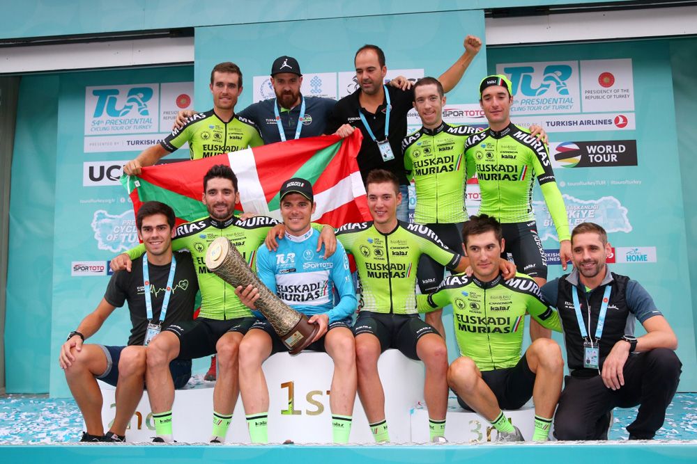 The Euskad- Murias team celebrate Prades overall victory