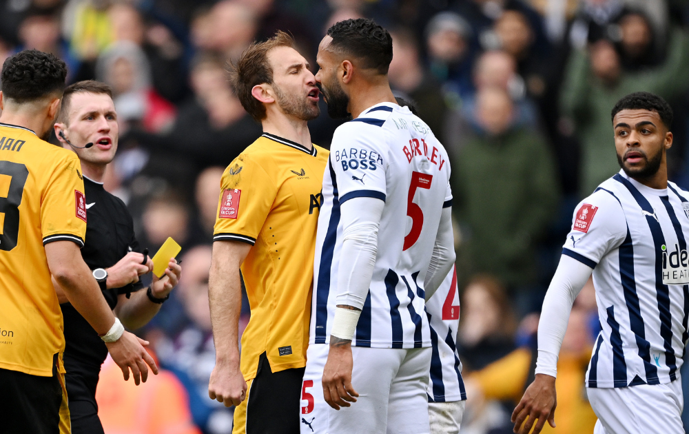 Craig Dawson of Wolverhampton Wanderers clashes with Kyle Bartley of West Bromwich Albion during the Emirates FA Cup Fourth Round match between West Bromwich Albion and Wolves