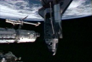 Shuttle Endeavour Docks at Space Station