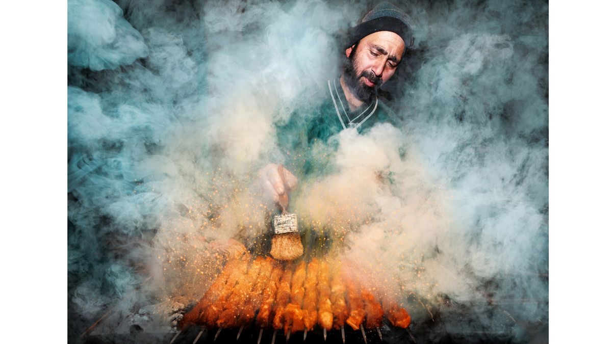 Smoky street stall shot scoops top rated prize in Pink Woman Foodstuff Photographer of the Year