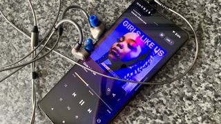Sony Xperia 1 IV and Sennhesier IE 600 wired earbuds with some Sennheiser blue Custom Comfort Tips applied, playing a Tidal Masters file