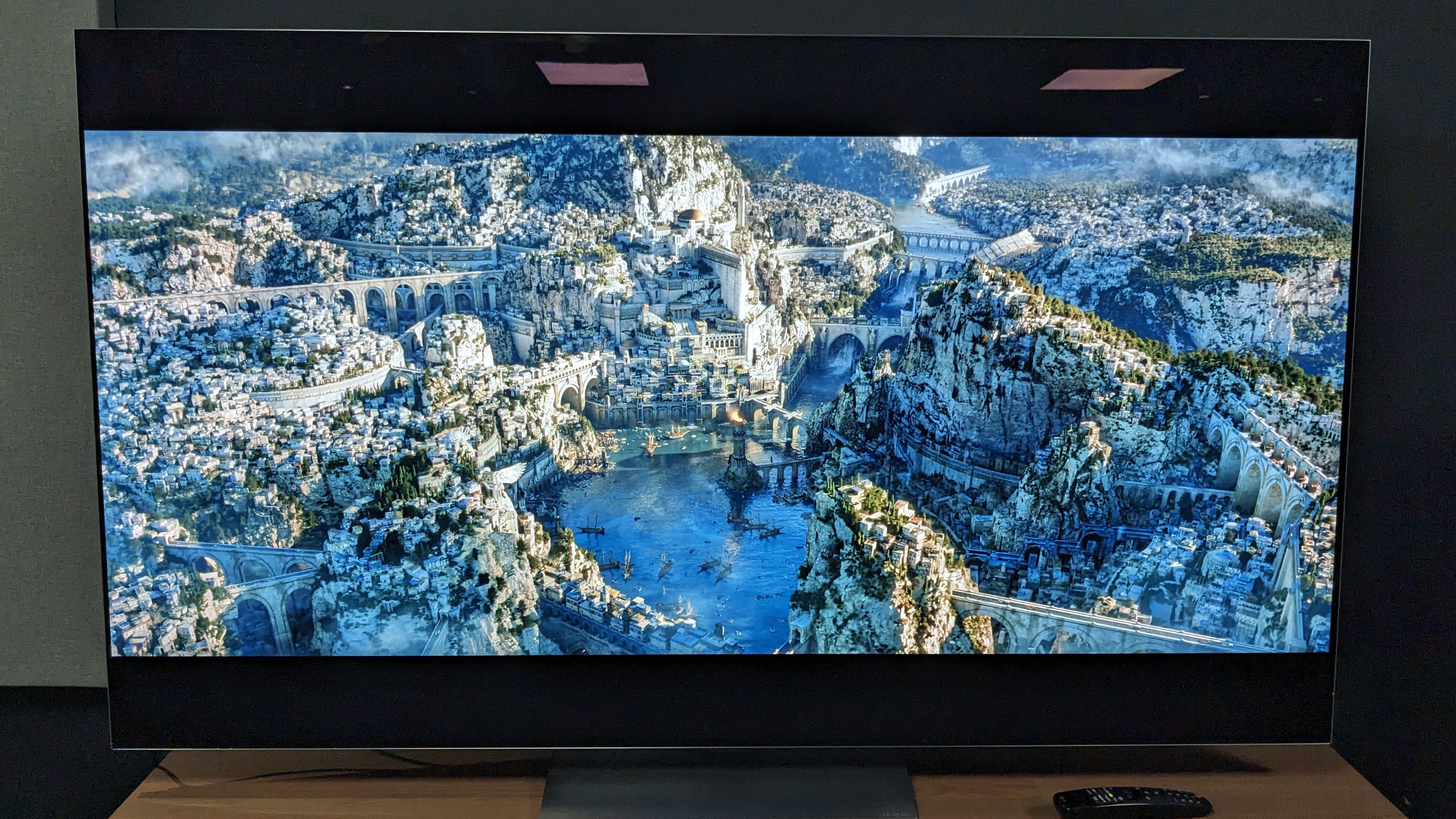 LG G3 with mountainous landscape on screen