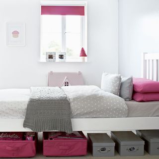 children bedroom with white wall and sugar pink doll house