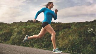 Woman runs wearing Garmin Forerunner 745