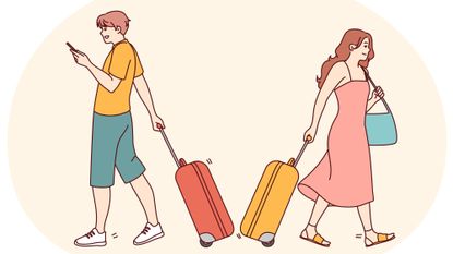 Couple with suitcases going opposite directions
