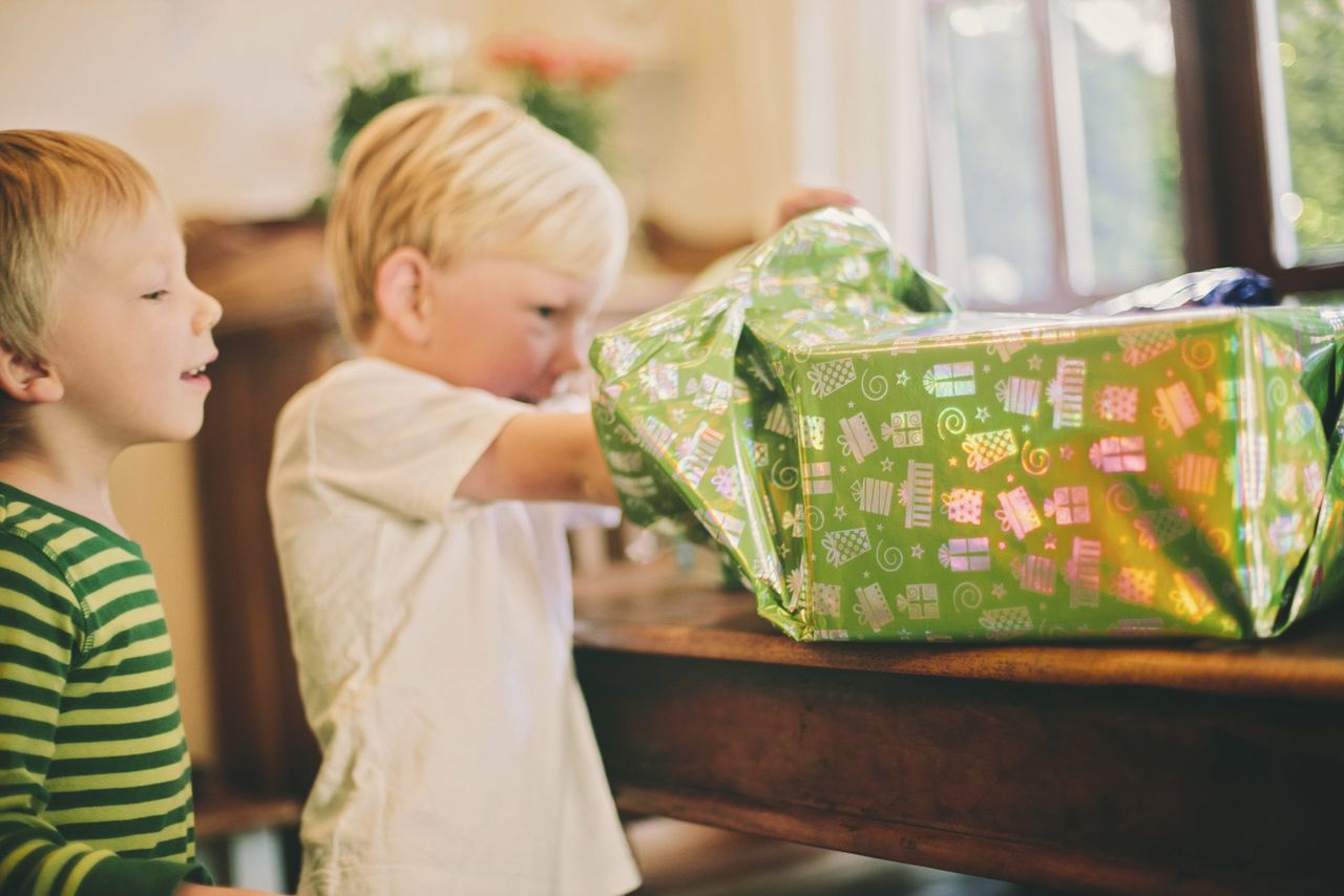 Child opening party presents