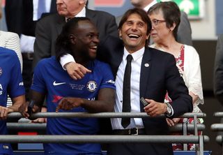 Victor Moses is set to team-up again with former Chelsea manager Antonio Conte (right)