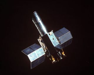 An artist's illustration of the International Ultraviolet Explorer satellite, which launched in 1978 to study ultraviolet light from distant stars.