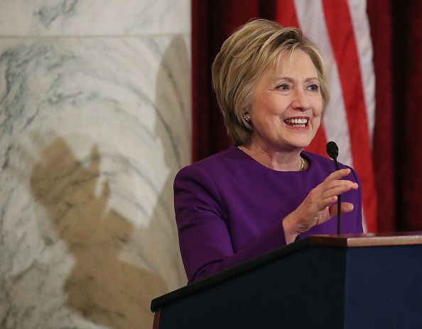 Hillary Clinton at the portrait unveiling ceremony for outgoing Senate Minority Leader Harry Reid in December, her last time in D.C.