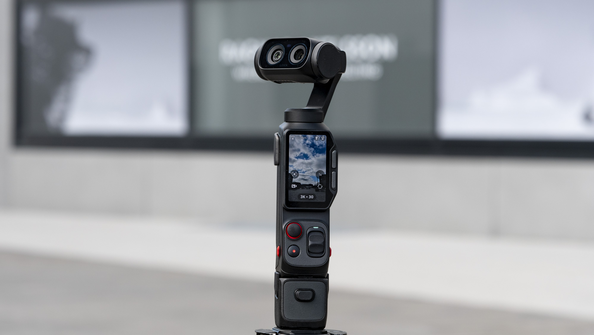 Insta360 Luna Ultra vlogging camera, outdoors in a grey urban scene