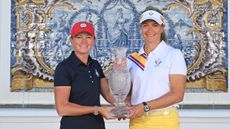 Stacy Lewis and Suzann Pettersen hold the Solheim Cup