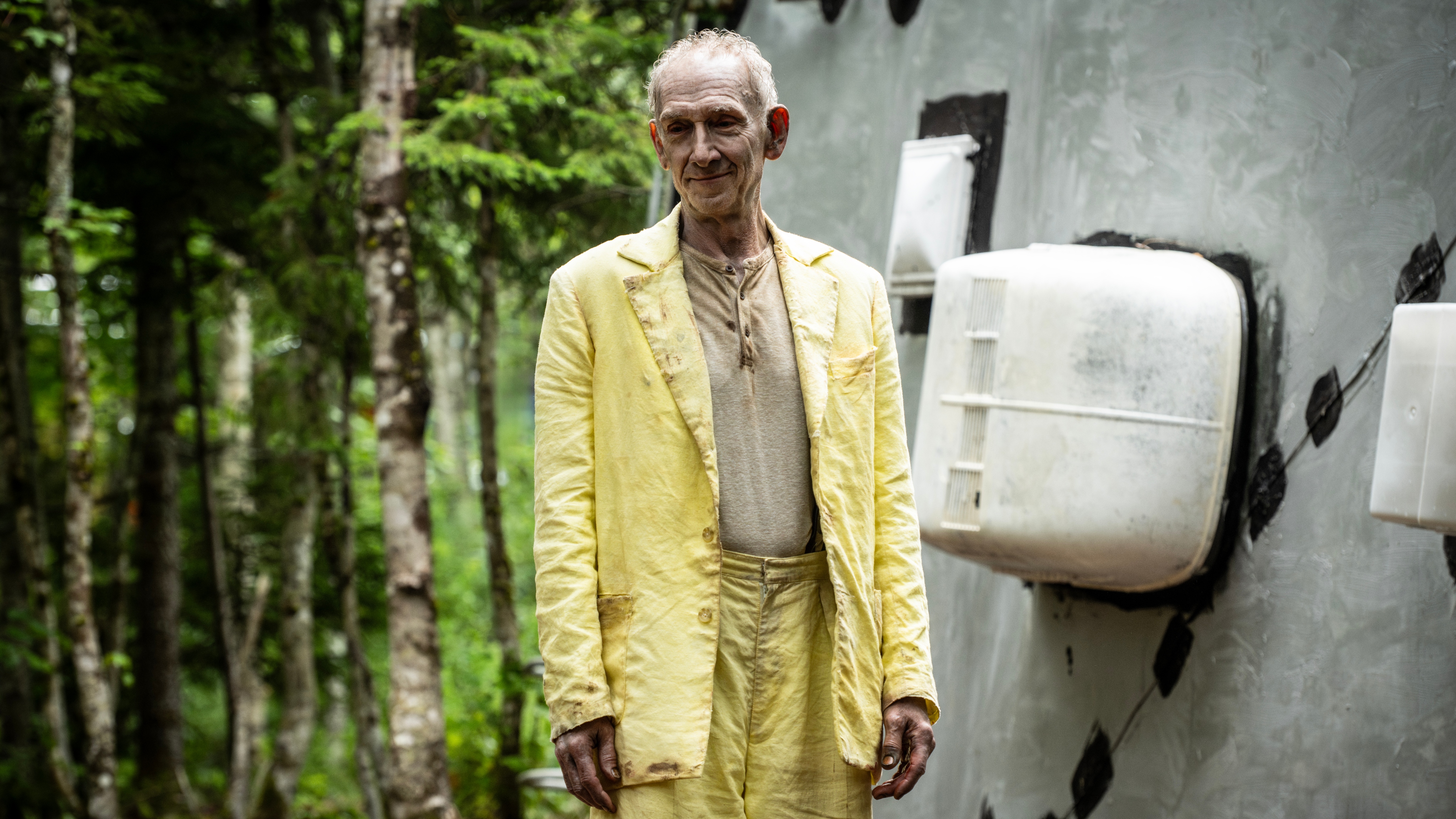 Man in Yellow in FROM season 4. A creepy old man wearing a dirty yellow suit.