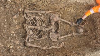 One of the decapitated skeletons from the newly discovered Roman town near Fleet Marston in Buckinghamshire.