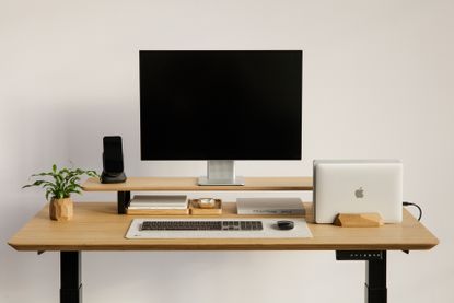 Wooden desk by Oakywood with computer shelf