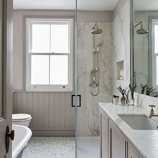 neutral bathroom scheme with marbled shower