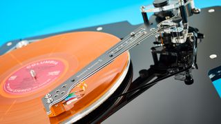 Turntable: Vertere DG-1 S/Magneto with orange vinyl record