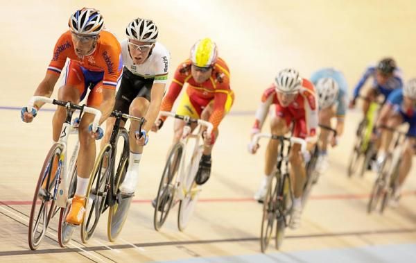 Cameron Meyer (Australia) marks Peter Schepp (Netherlands) as he puts the hammer down in the men's points race.
