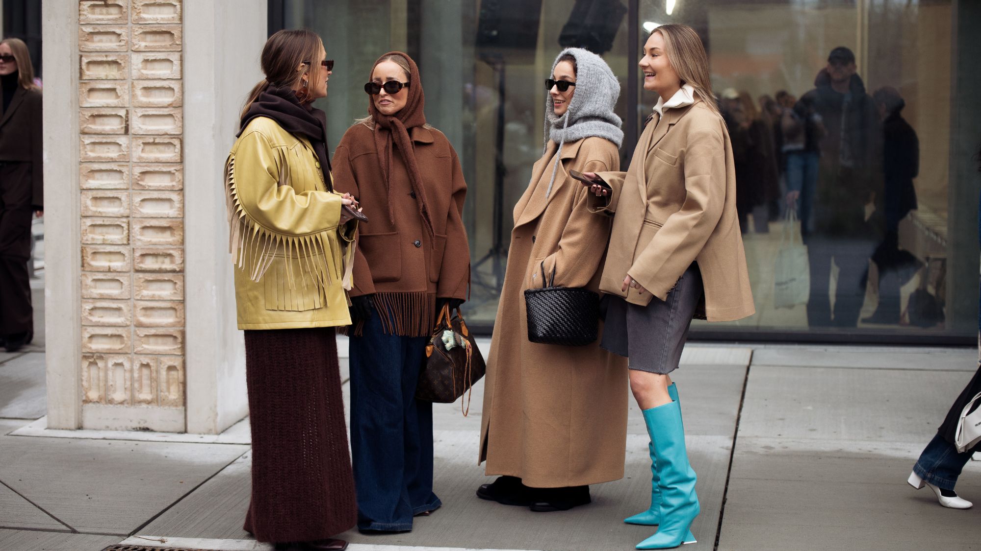 street style shot of four women in winter clothes
