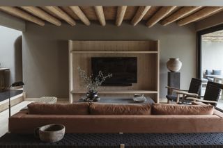 A living room with wooden elements