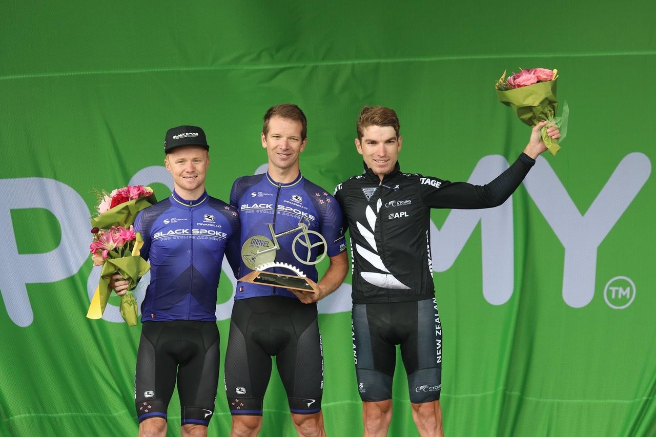 Aaron Gate atop the podium at the 2021 Gravel and Tar Classic