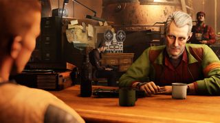 Wolfenstein 2: The New Colossus screenshot shows two people sat at a table.