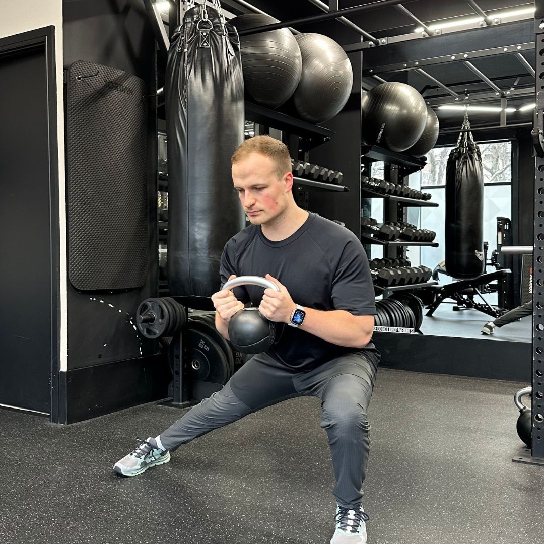 Personal trainer Ollie Thompson demonstrating a three-way lunge