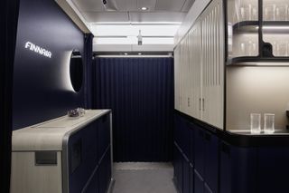 Cabin interior with storage and glassware in new Finnair Business Class by Tangerine
