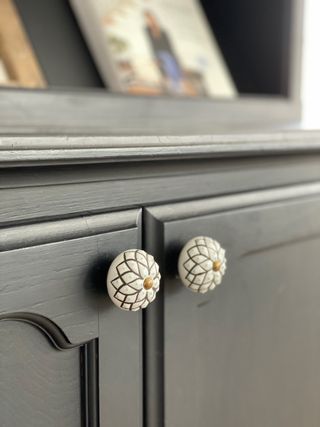 Built-in cabinet with decorative door pulls