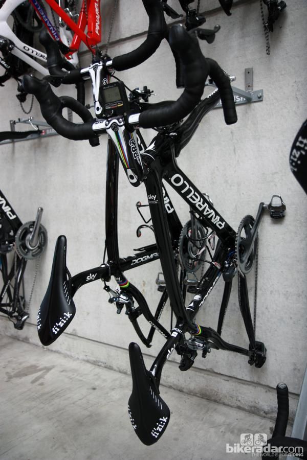 Mark Cavendish's Pinarellos stray from the stark black-and-white paint scheme only slightly with a set of rainbow stripes around the seat stay wishbone and on the PRO stem.