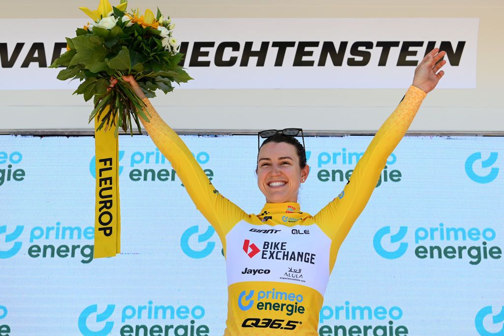 VADUZ SWITZERLAND JUNE 19 Kristen Faulkner of The United States and Team BikeExchange Jayco celebrates at podium as Yellow Leader Jersey winner during the 2nd Tour de Suisse Women 2022 Stage 2 a 256km individual time trial stage from Vaduz to Vaduz ITT ourdesuisse2022 on June 19 2022 in Vaduz Switzerland Photo by Tim de WaeleGetty Images