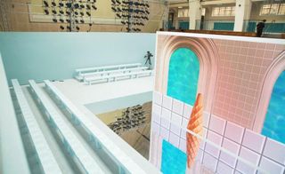 a reflective catwalk, which covered a former swimming pool in the middle of London's Seymour Leisure Centre