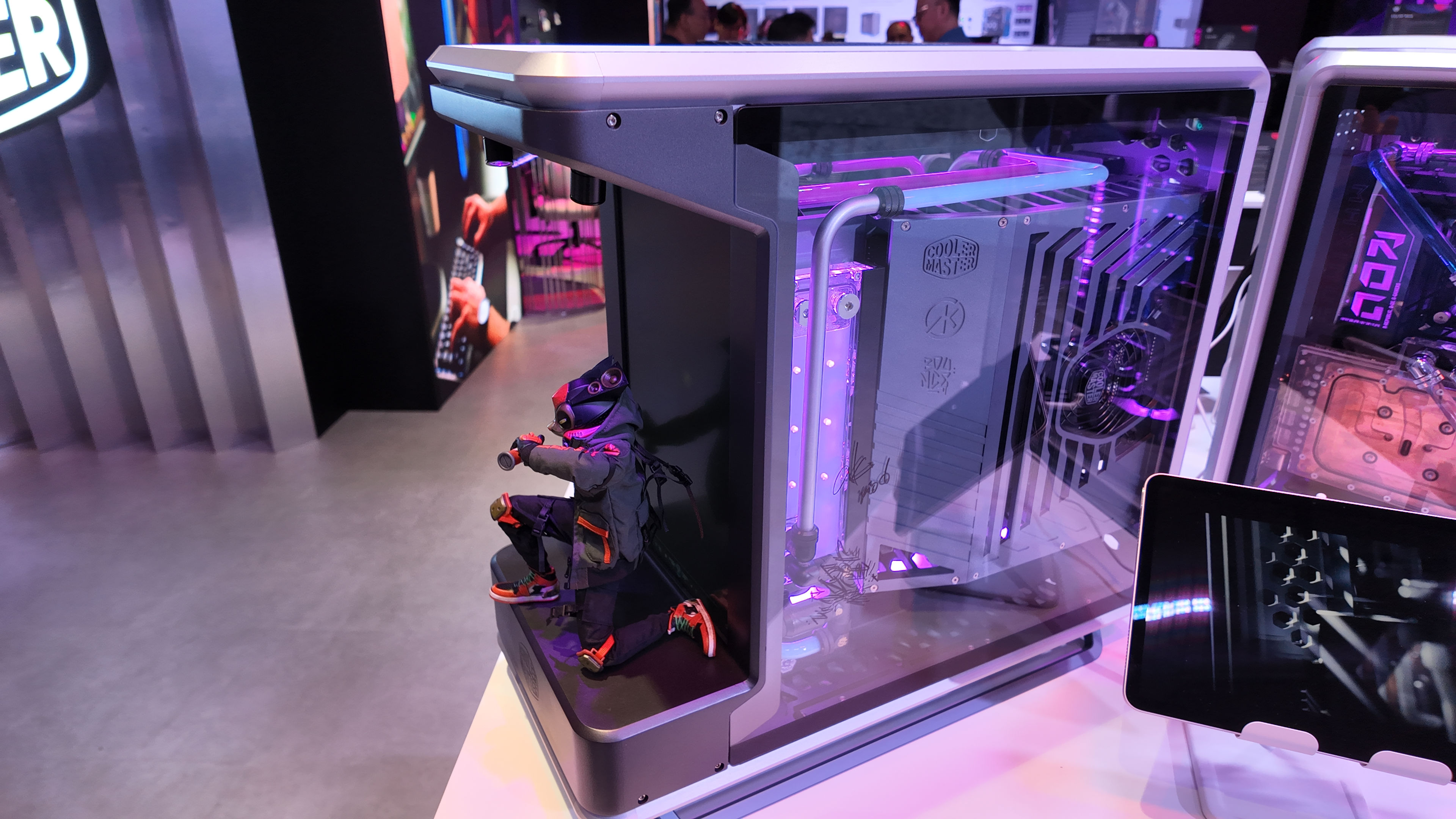 A photo of the Cooler Master MasterFrame 360 Panoramic PC case, as displayed at Computex 2025