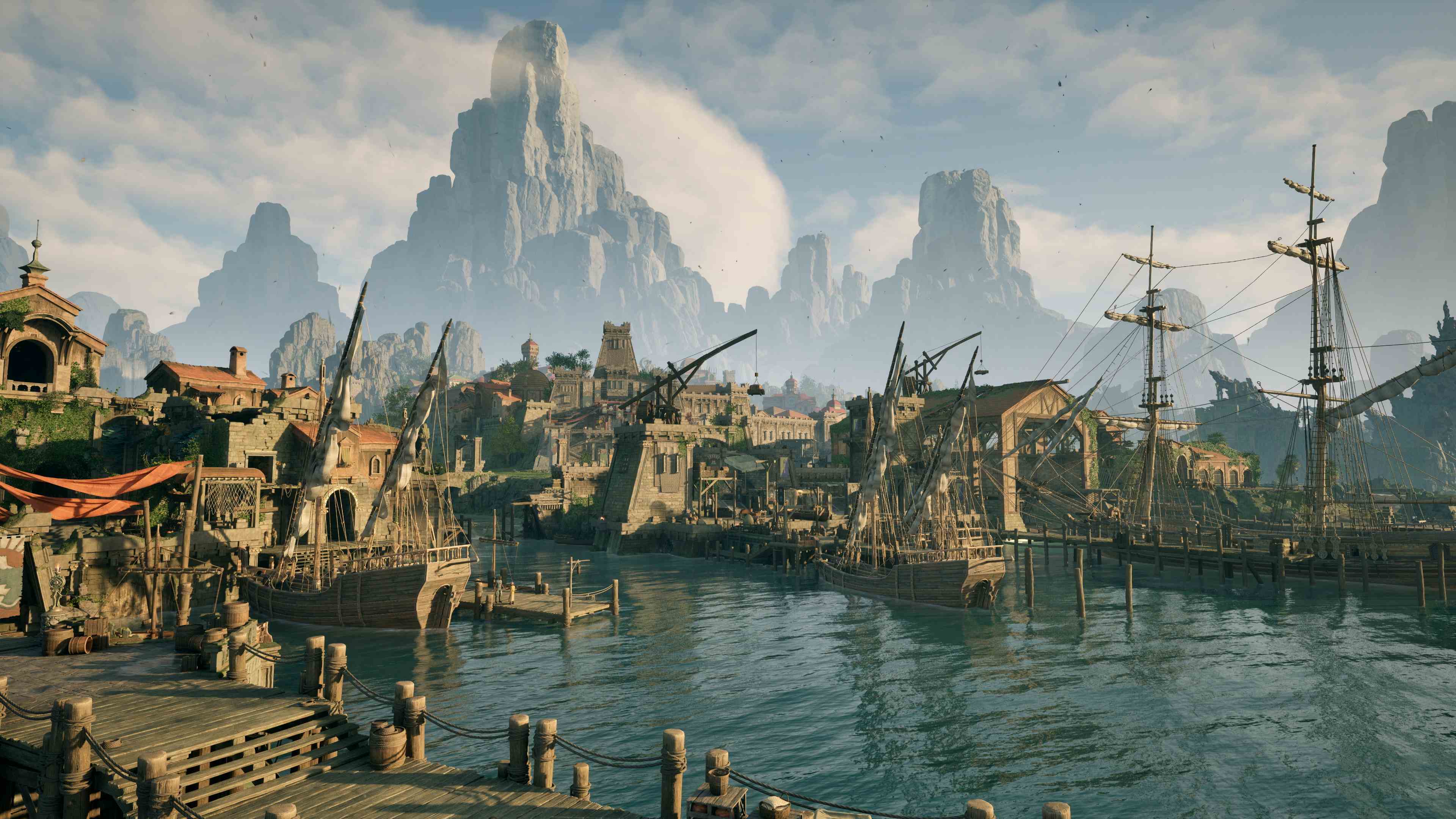 Screenshot of Avowed showing the docks of a great city with mountains in the distance.