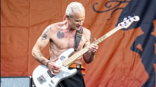Flea performing with Red Hot Chili Peppers