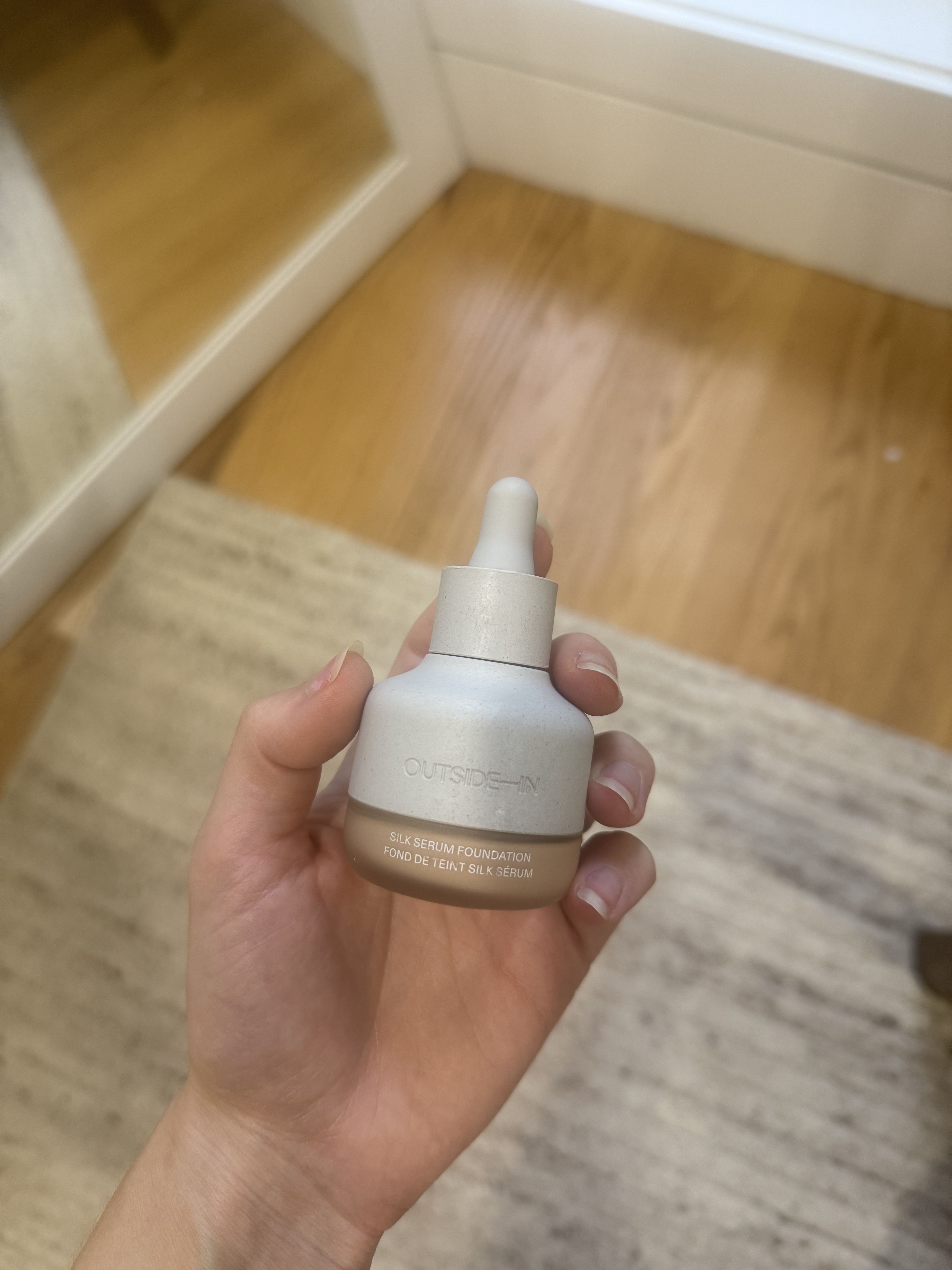 Photo of Jamie Schneider testing Outside In&#039;s Silk Serum Foundation