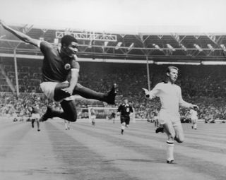 Eusebio scores for Portugal at the 1966 World Cup.