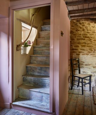 boxed in staircase in a stone cottage